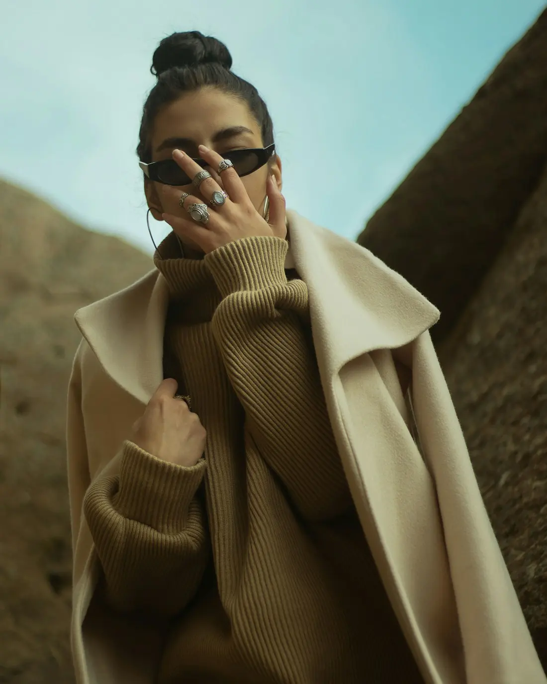 Sévigné Ottoman-Wool Cape photographed on a plain studio ground